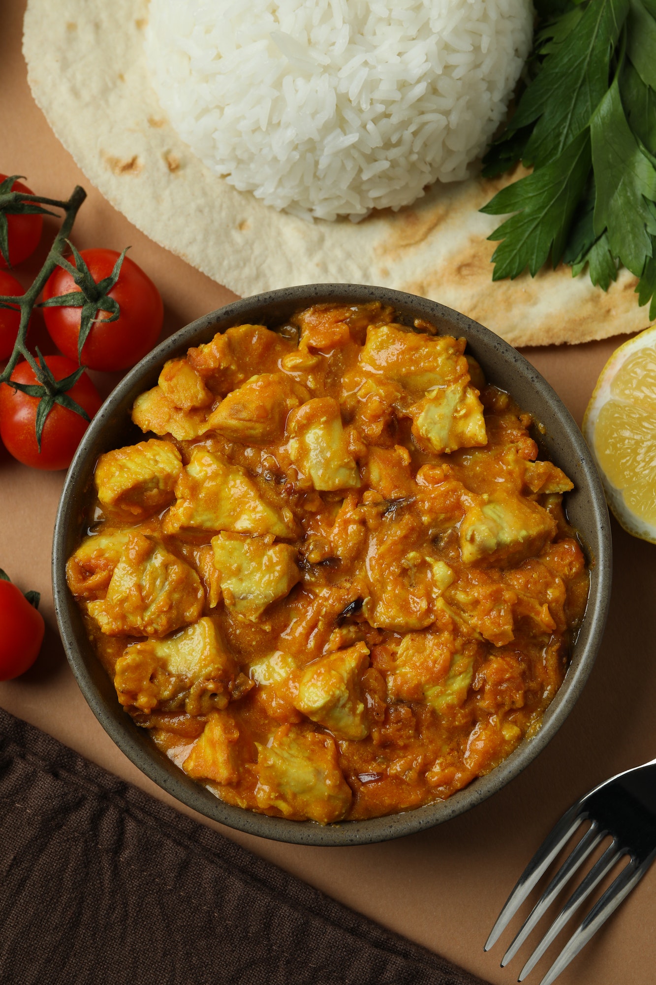 Concept of tasty food with chicken tikka on beige ​background