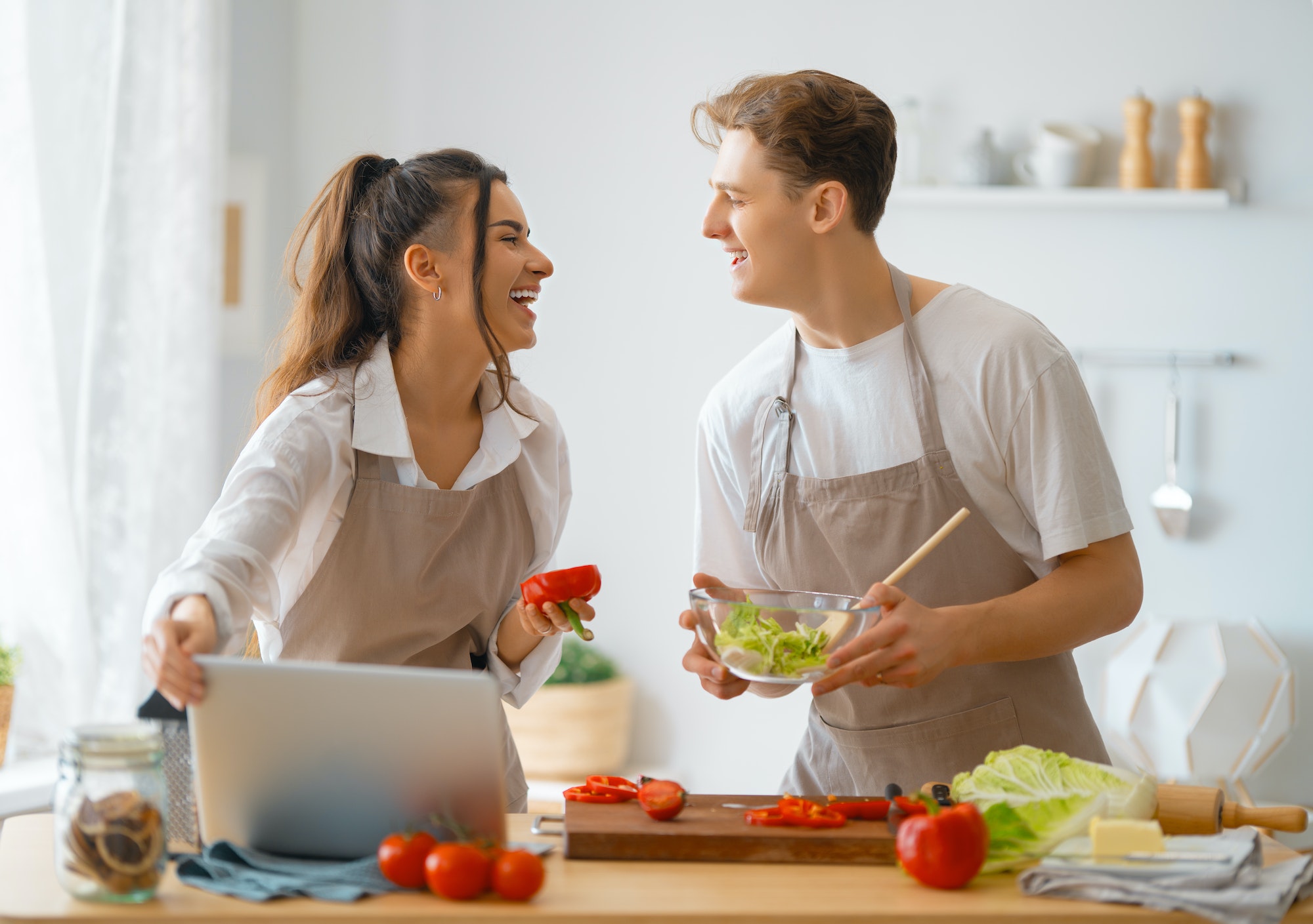 loving couple is preparing the proper meal