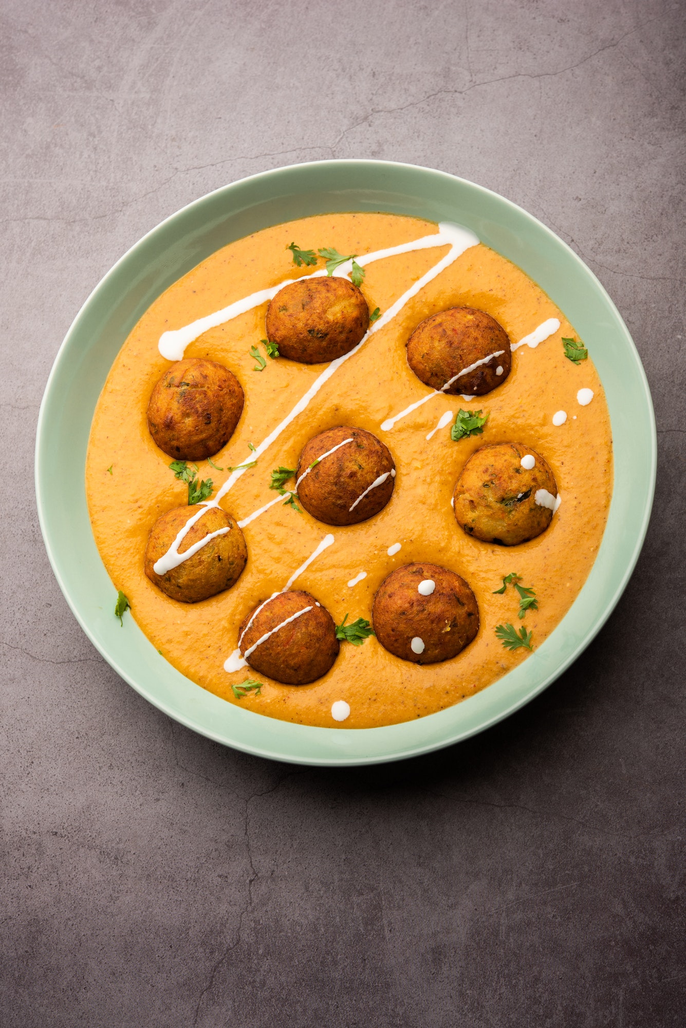 Tasty Malai Kofta Curry served in a bowl. Indian food